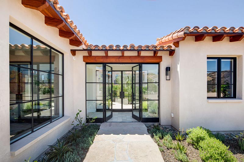 Entryway with black steel glass doors